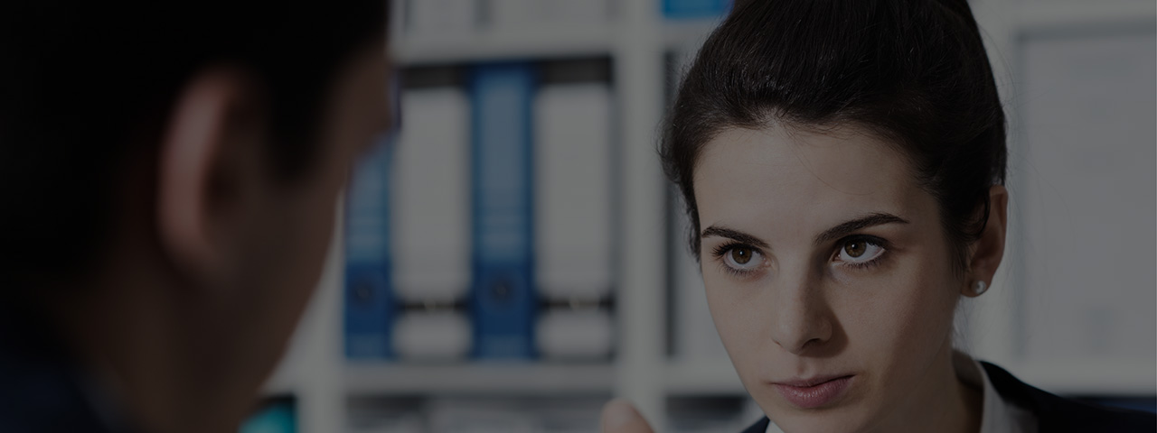 Woman arm wrestling with intense look on her face, probably trying to get budget to for mobility tracking